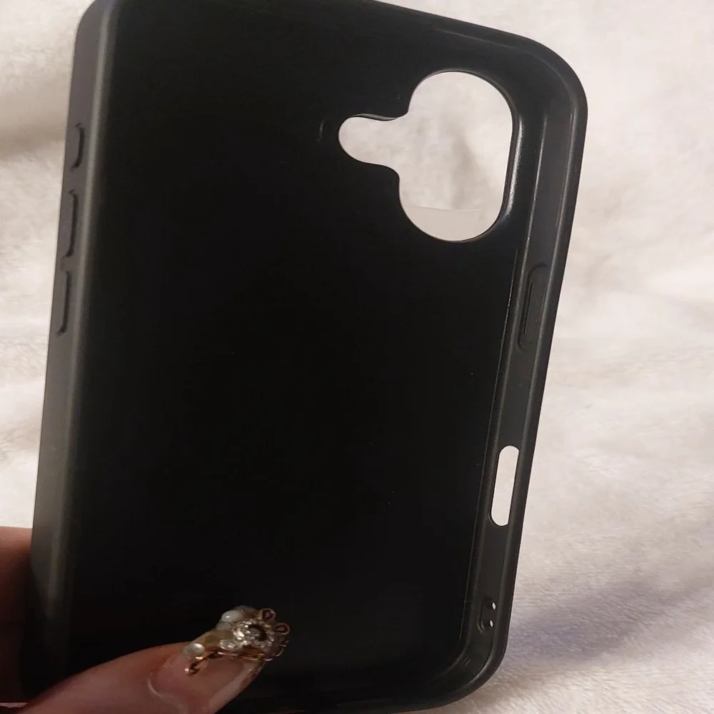 Celine Black Triomphe Phone Case. I don't know what phone this fit , not mine!